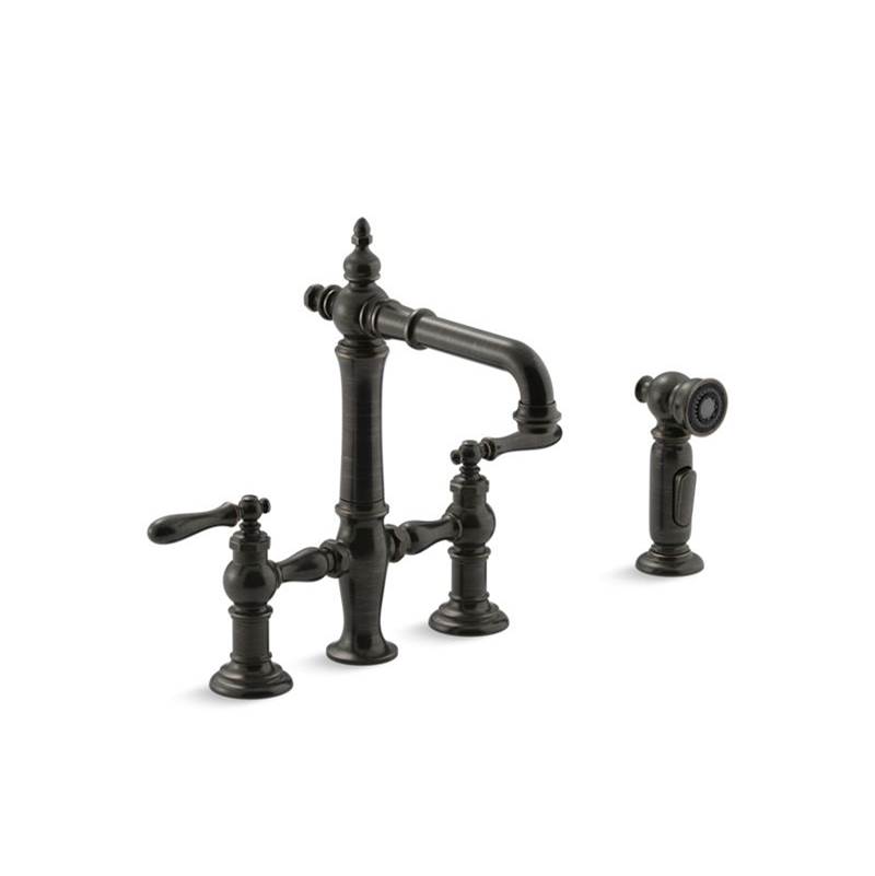 Kohler Artifacts® Deck-mount bridge bar sink faucet with lever handles and sidespray