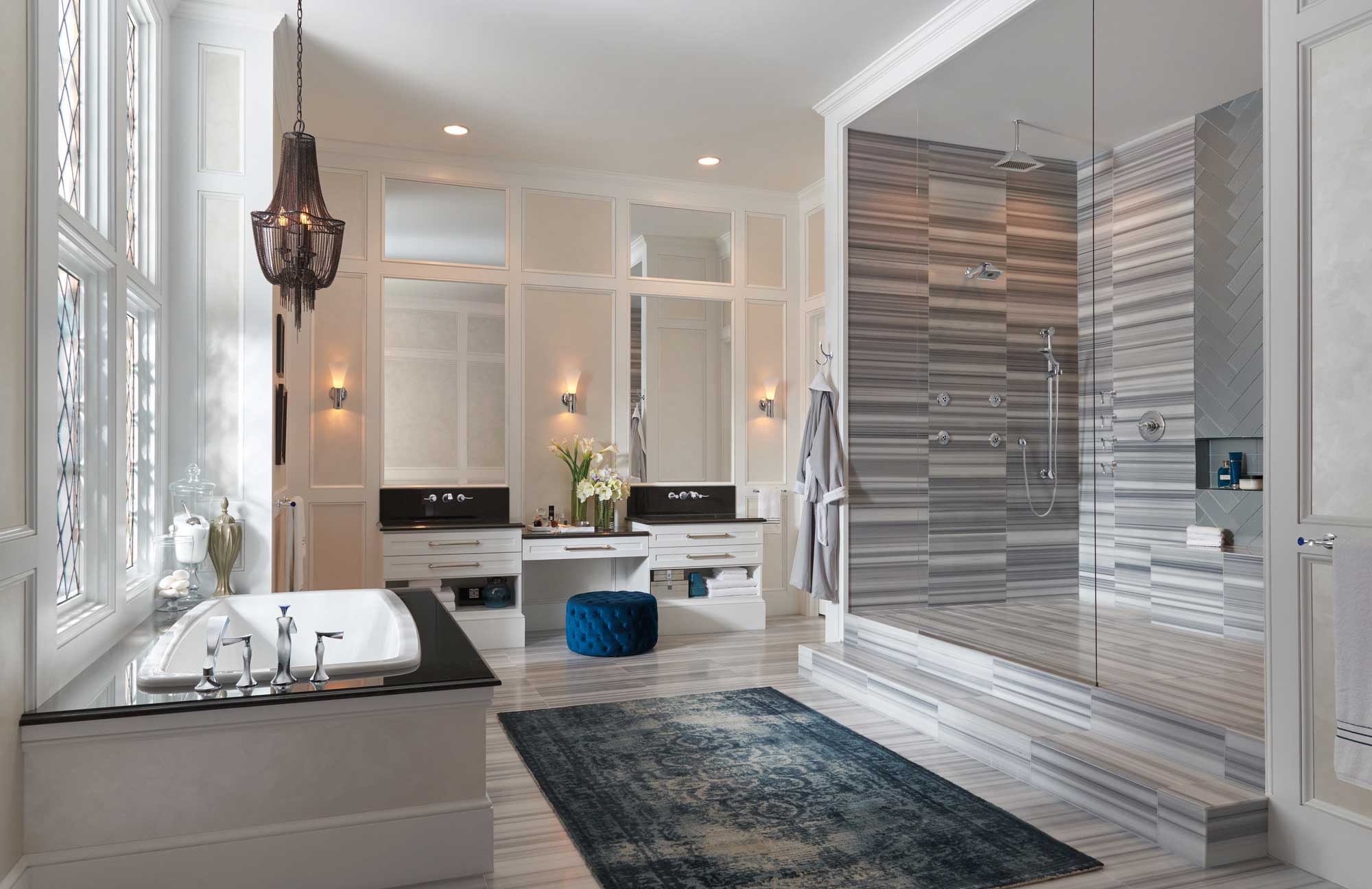 luxurious bathroom with oversized walk in shower and freestading tub